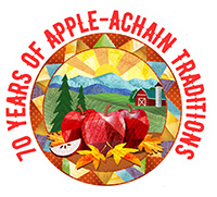 Apple Festival 70th year logo features apples in the foreground with a barn and mountains in the background